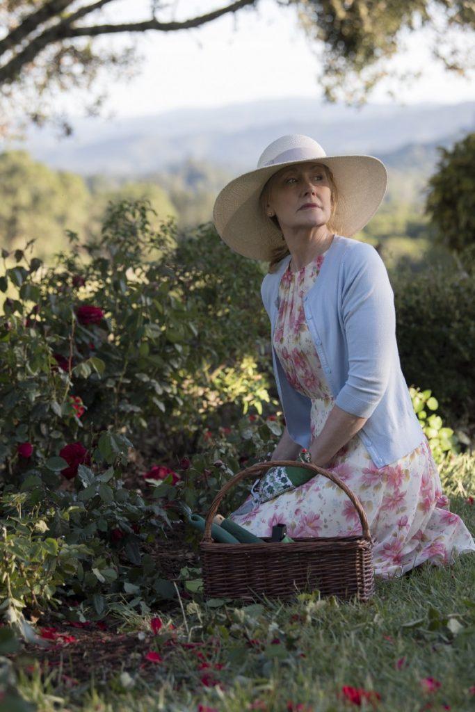 Sharp Objects's Patricia Clarkson as Adora Crellin tends to roses. Photo credit: Anne Marie Fox/HBO
