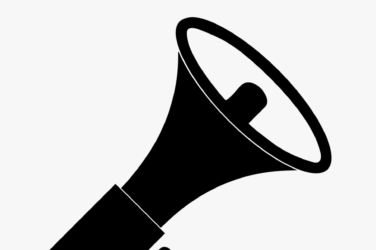 Black hand holding a megaphone