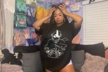 Tiffie Starchild in BlackMilk Aaang t-shirt