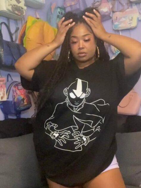 Tiffie Starchild in BlackMilk Aaang t-shirt