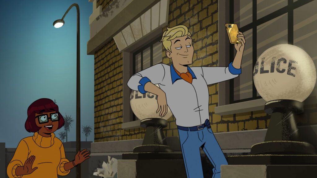 Velma starring at Fred