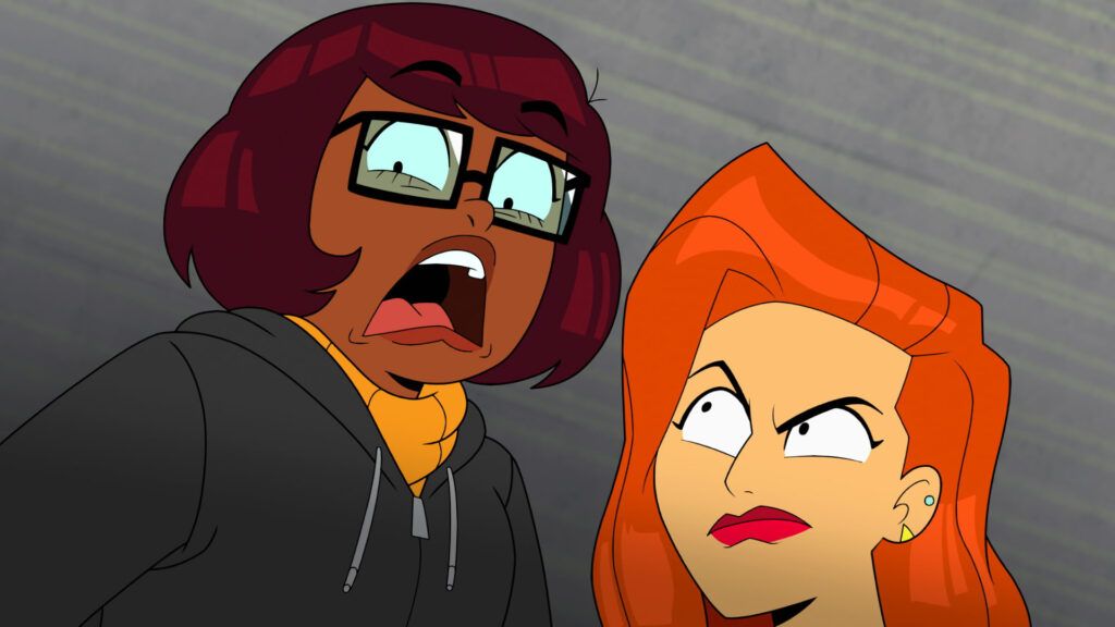 Velma screaming and Daphne scowling her
